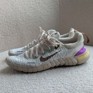 Nike Cream Sneakers with Brown and Purple Accents